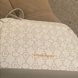 Nanette Lepore Cream and Tan Crossbody Bag with Monogram Design
